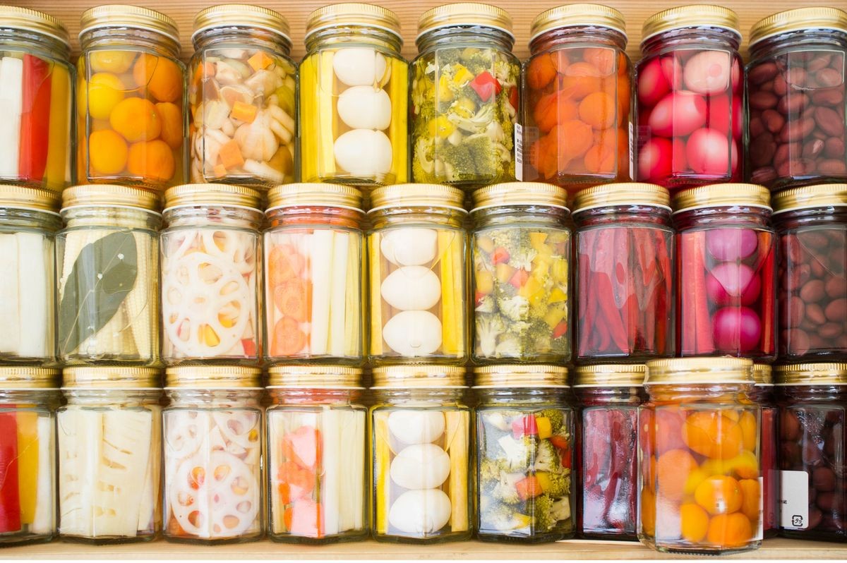 Food preservation colorful pickled fermented food preserved jar. preserving pickles glass organic. preserves jars pickled canning vegetable cucumber pickle winter. 