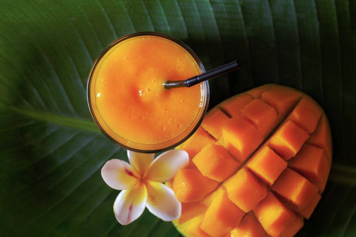 
Mango smoothie. Mango shake. Tropical fruit concept.