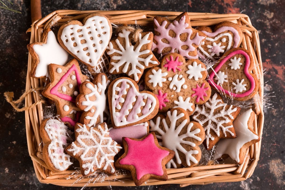 Christmas Cookies in a shape of Snowflake, Heart and Star. Cookie Exchange. Basket with Old-Fashioned Gingerbread Cookies. Perfect for holiday season. 