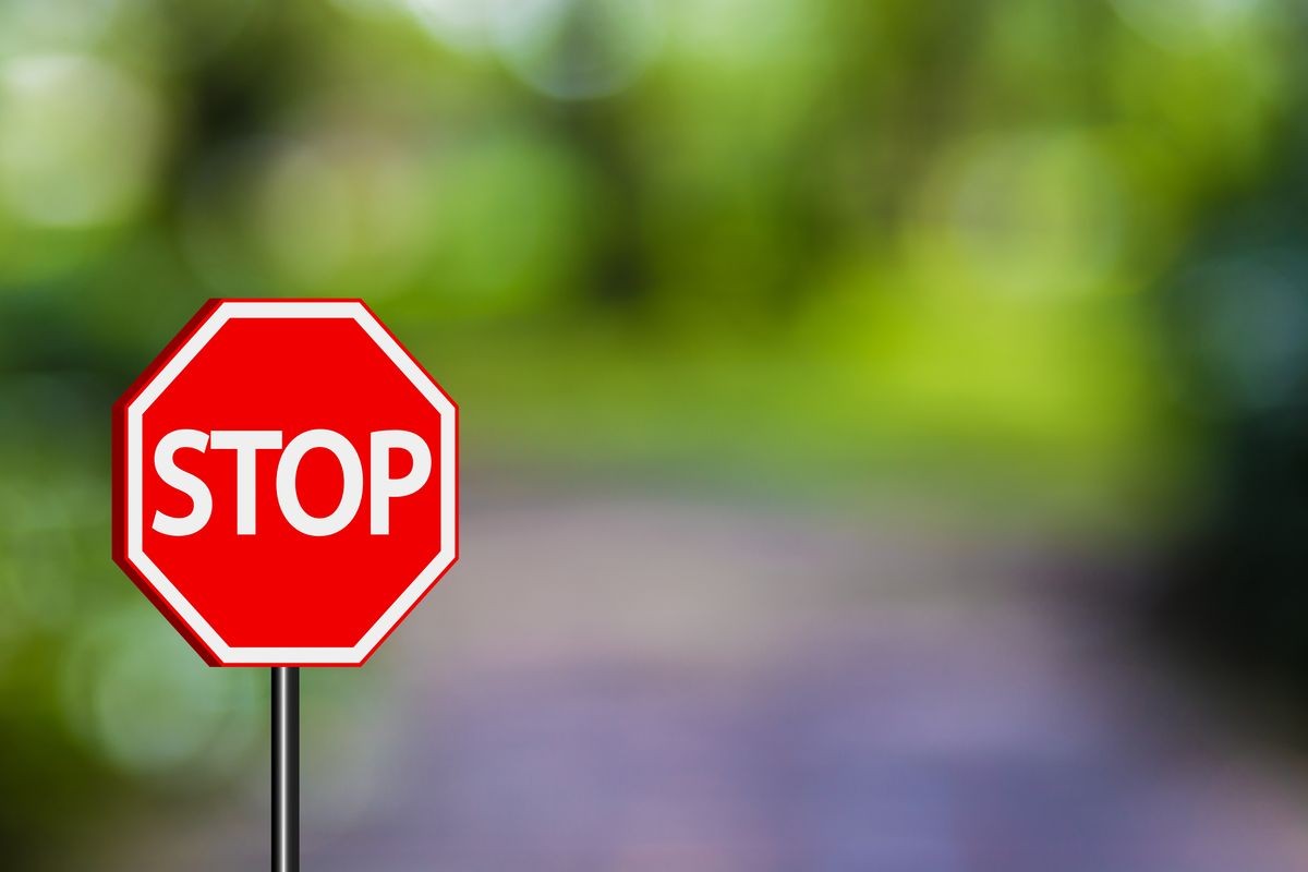 Stop sign traffic signs,Red Stop sign on blue green nature background