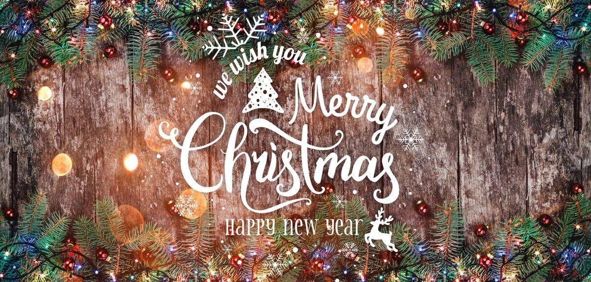 Christmas and New Year Typographical on wooden background with Fir branches. Xmas and Happy New Year theme. Flat lay, top view, copy space, wide composition