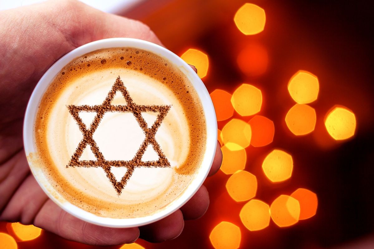 a cup of coffee in Israel cappuccino with a picture of the star of David