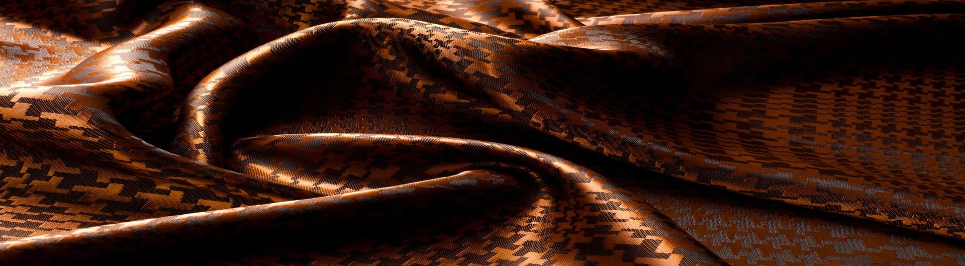 The texture of the silk fabric, painted with a brown pattern.  macro texture of brown striped fabric studio. Artistic fabric texture, folded, wavy. 