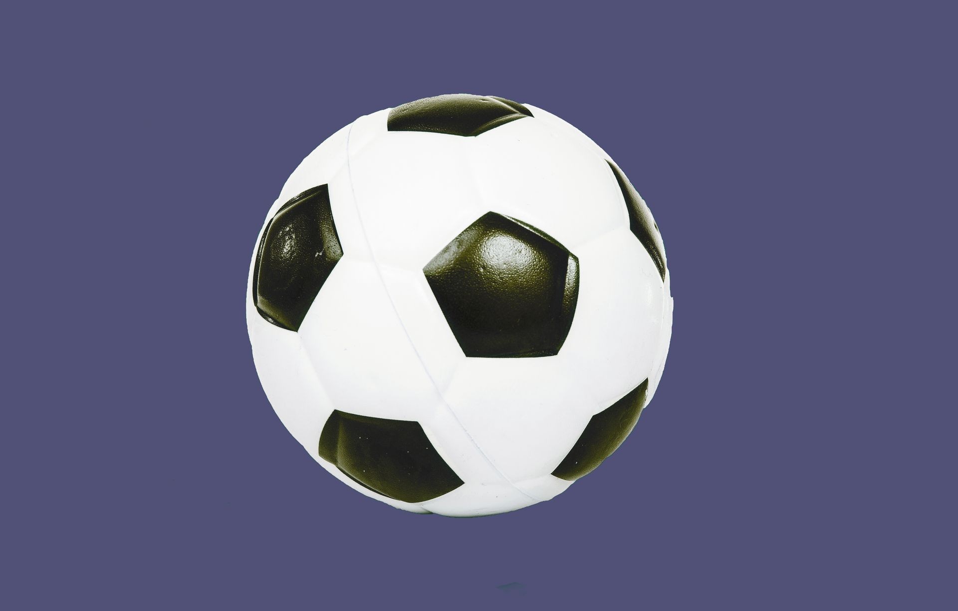 Football ball white and black soccer ball in isolated background. Soccerball Realistic soccer ball isolated on white background with clipping path. Colorful background.