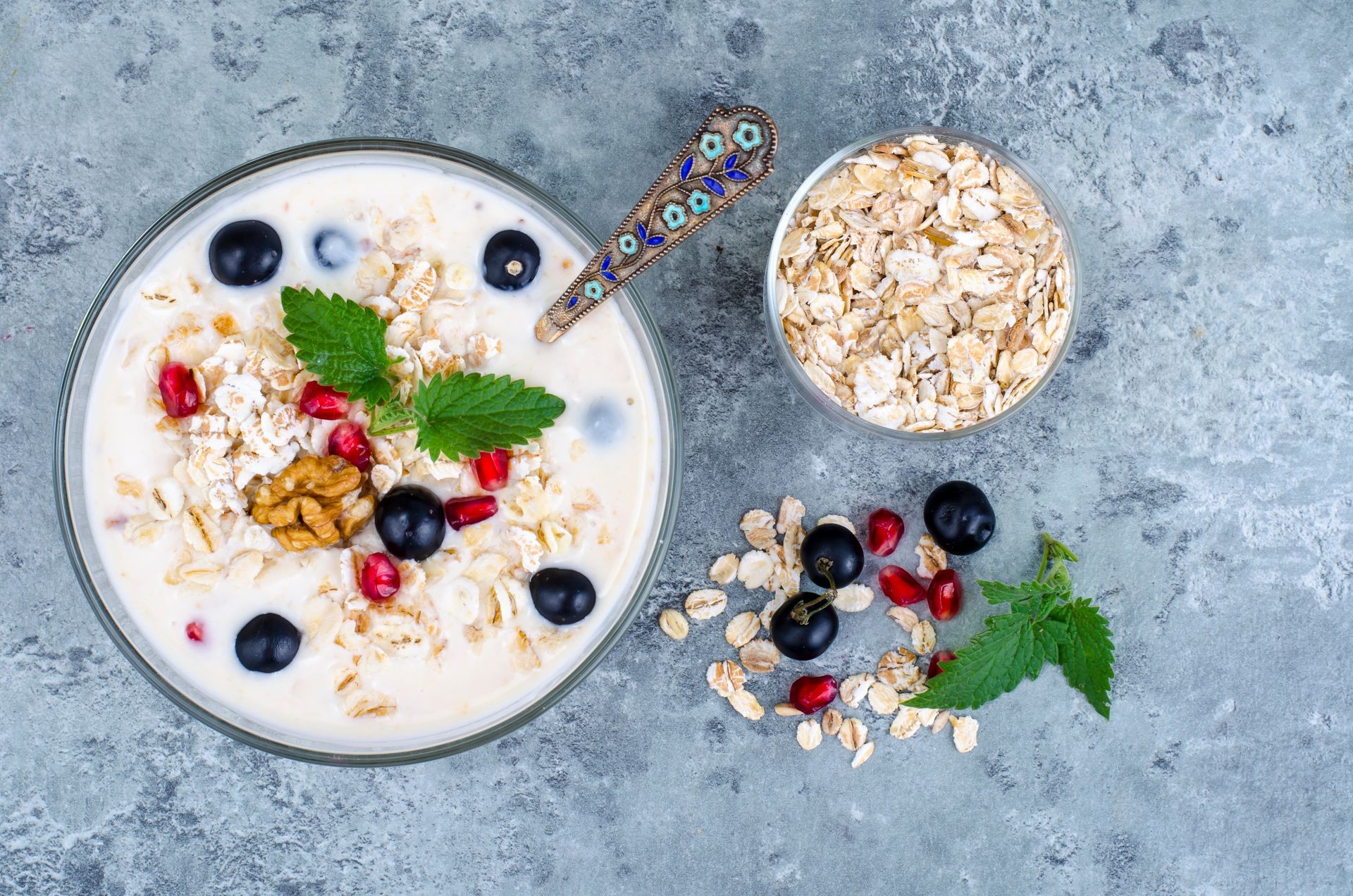 Healthy delicious muesli with oatmeal and pomegranat. Studio Photo