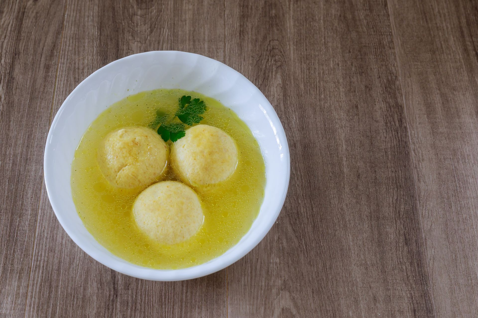 Homemade Matzo Ball Soup in a Bowl Jewish Holiday symbol,Jewish soup, Jewish eating,