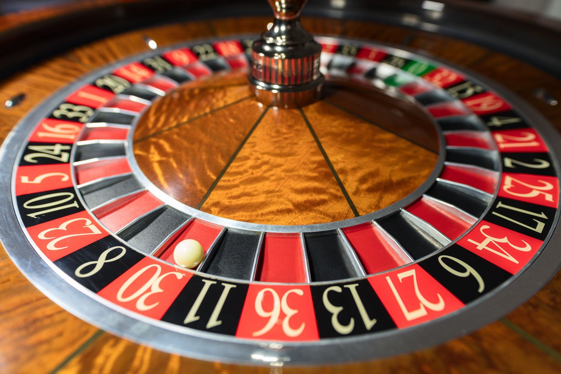 American Roulette wheel with a ball in the number '30'