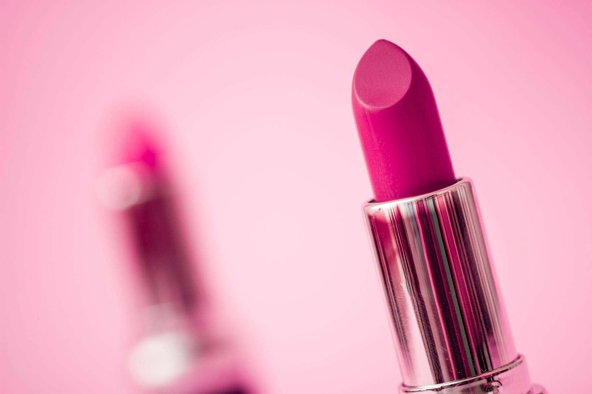 Matt lipsticks on pink background