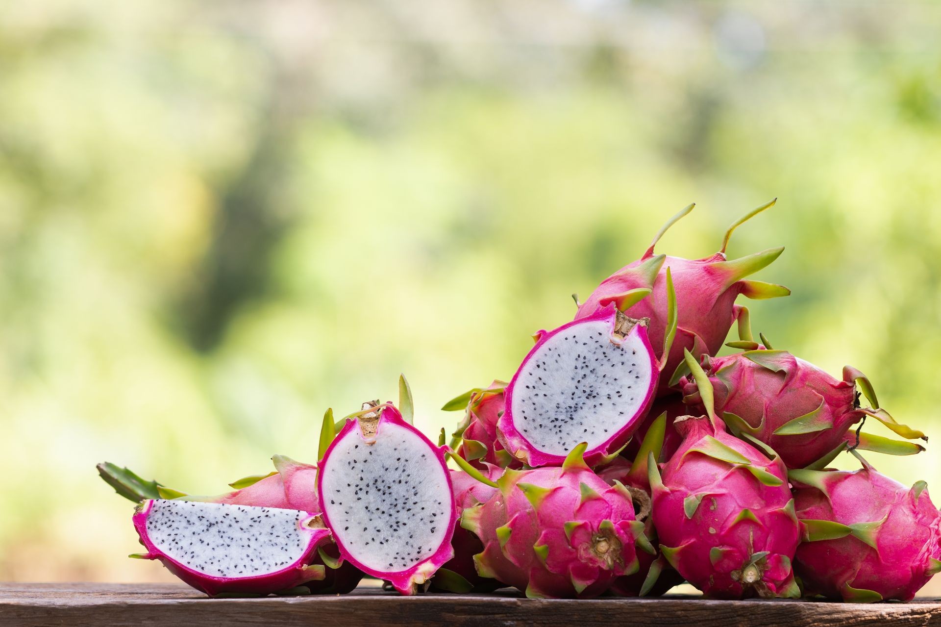 Dragon Fruit On old Wooden Table