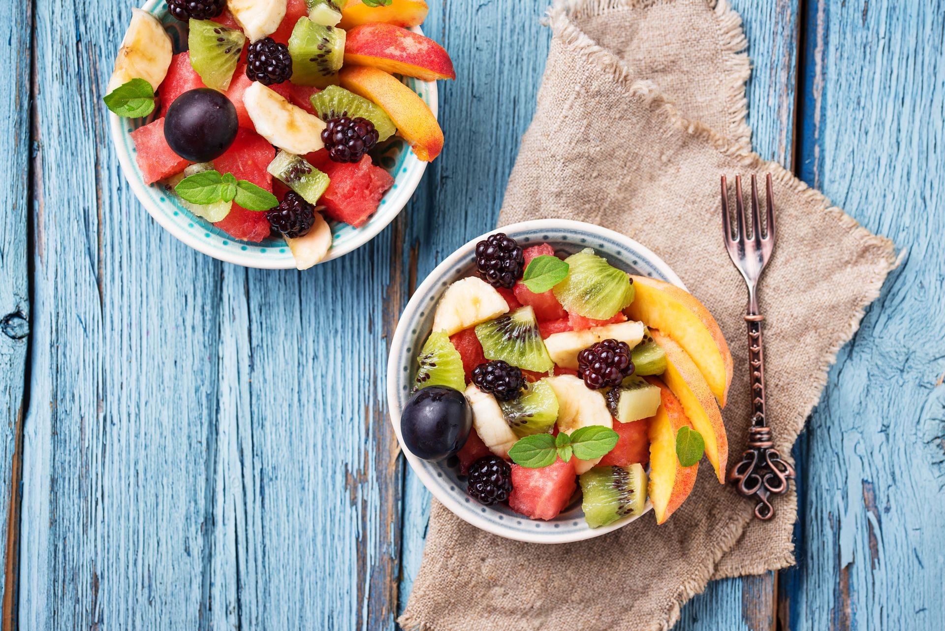 Fruits salad with watermelon, banana, kiwi and berries